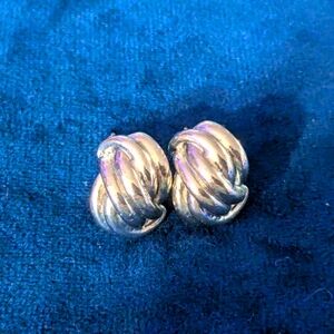 Vintage clip on silver tone knot design earrings